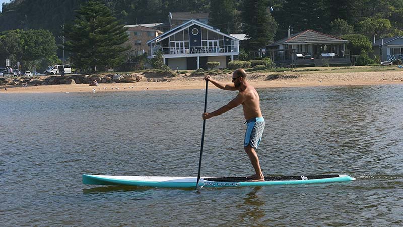 crowding others paddle boarding